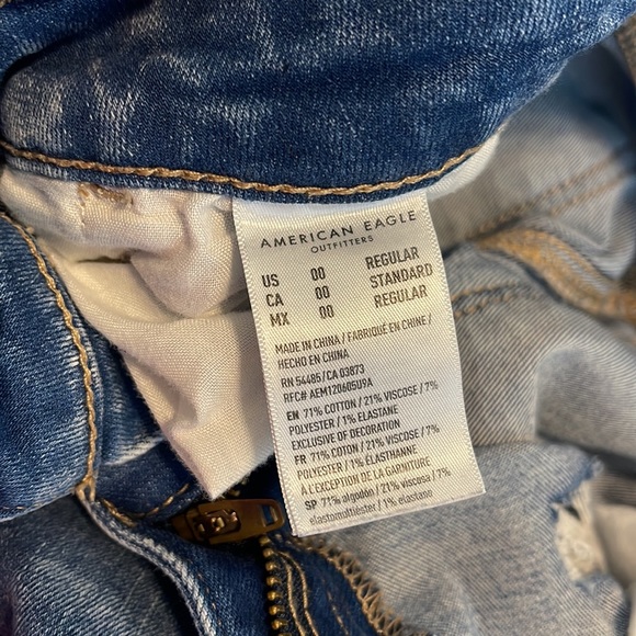 Medium wash skinny jeans with holes - Picture 4 of 4